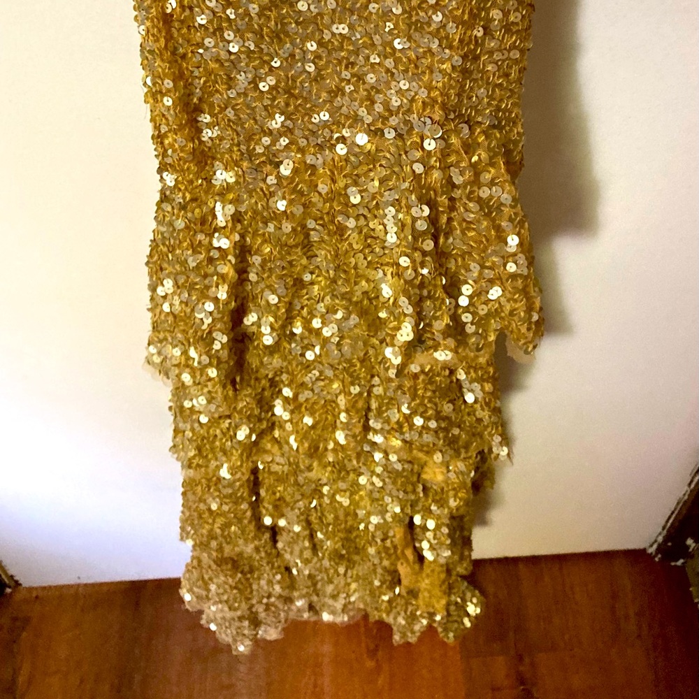 Gold sequined prom dress. Floor length. Split in front side. Halter top.